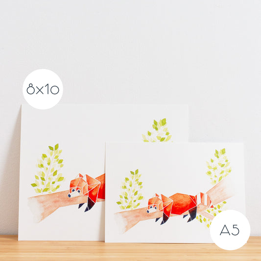 Watercolour painting art print. The watercolour illustration shows an origami red panda lying down on a tree branch with leaves.