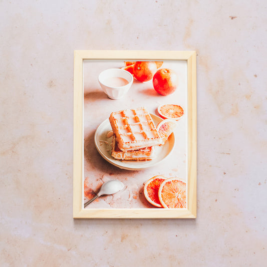 Photography of Waffles and Blood Orange on a pink marble background sold as a giclee fine art print