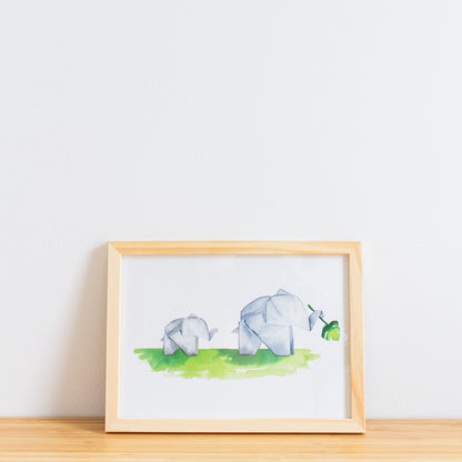 Watercolour painting art print. The watercolour illustration shows two painted origami elephants on green grass with one holding a monstera plant leaf.