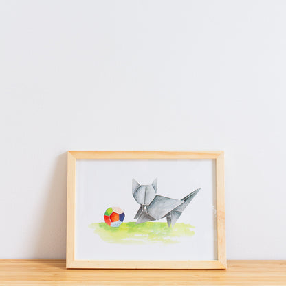 Watercolour painting art print. The watercolour illustration shows an origami grey cat playing with a colourful origami ball.