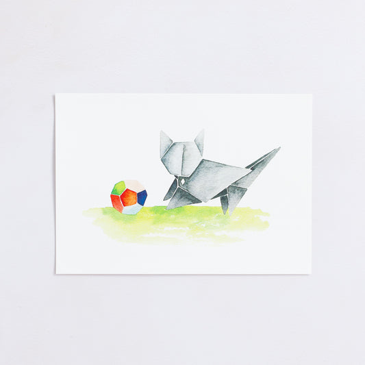 Watercolour painting art print. The watercolour illustration shows an origami grey cat playing with a colourful origami ball.