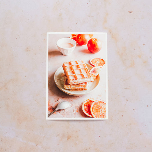 Photography of Waffles and Blood Orange on a pink marble background sold as a giclee fine art print