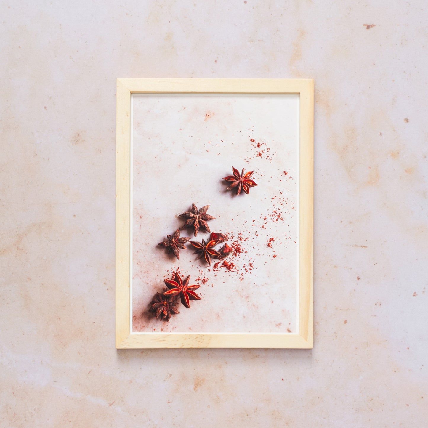Photography of Star Anise on a pink marble background sold as a giclee fine art print