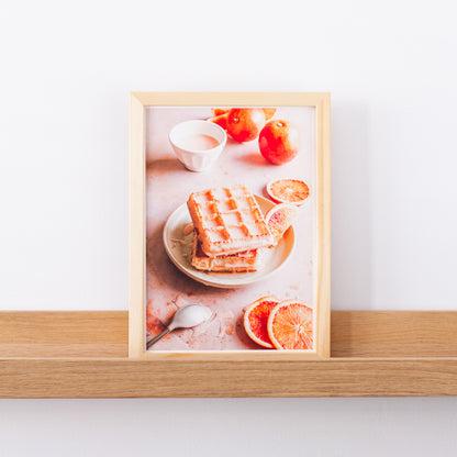 Photography of Waffles and Blood Orange on a pink marble background sold as a giclee fine art print